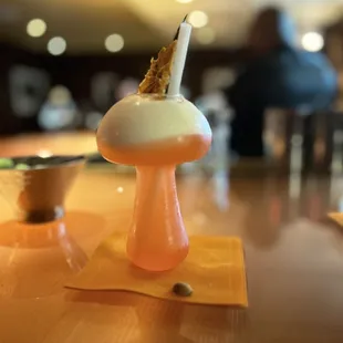 a mushroom shaped dessert on a table
