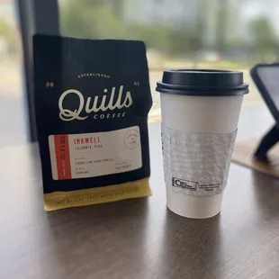 Coffee beans and a drip coffee