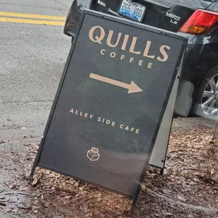 a sign on the side of the road