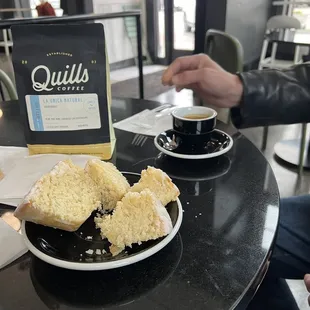 a plate of cake and a cup of coffee