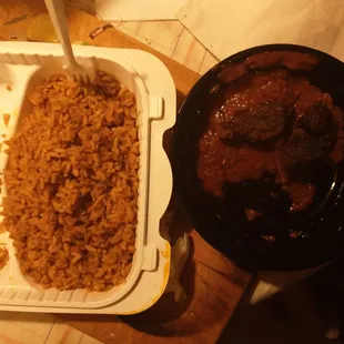 Rice and three pieces of dried and tough beef in a little bit of sauce.  This is beef stew?