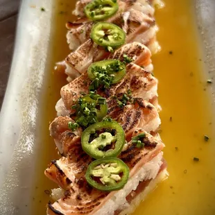 Torched and pressed salmon.