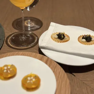 a plate of food and a glass of wine