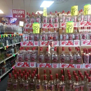 a large display of liquor bottles