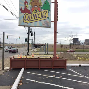a sign for quincy&apos;s fish