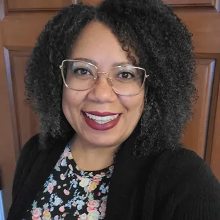 Joy J.