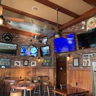 a bar with a brick wall