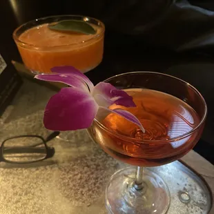 24 KT Magic and a Tsu Baki (riff on a boulevardier using Japanese whiskey and orange bitter infused Campari)