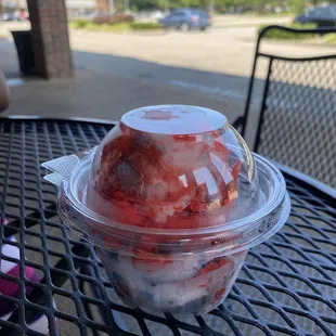 strawberries in a plastic container
