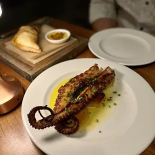 Grilled Octopus with potatoes &amp; beef empanada