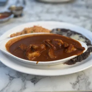 Chipotle prawn with rice and beans.