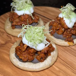 a close - up of three tortillas