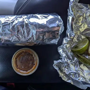 Super burrito, sauce, lime, grilled garlic and pepper