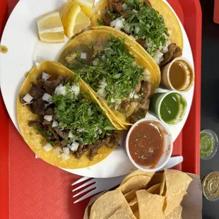 Taco trio combo... from the top, Pastor, Chili-Verde, &amp; Carne Asada.