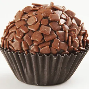 It is a bonbon, made from a rich mixture of chocolate, sweeted condensed milk, butter and flavoring ingredients; cooked slowly until it has