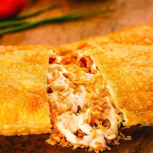 Thin Pastry Enveloped Fried with Tasty Moist chicken and Catupiry Cheese Stuffing.