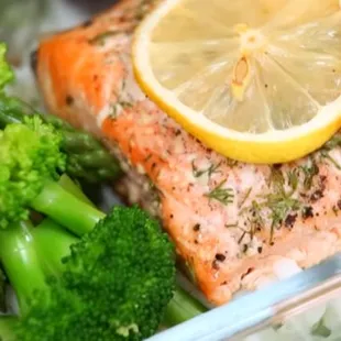 6 oz Salmon seasoned with garlic, dill, lemon, salt and black pepper Sides: Steamed Vegetables and Jasmine Rice.