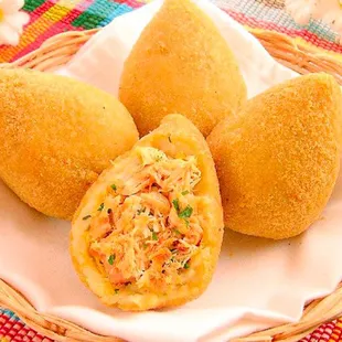 Chicken fritters, deep fried pastry crunchy on the outside with a moist, and flavorsome chicken filling on the inside.
