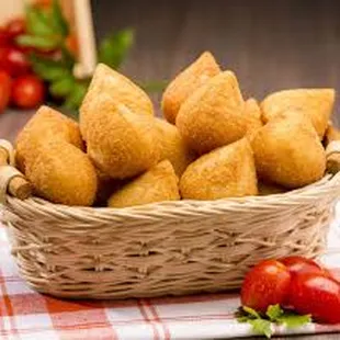 Heart of Palm Fritters: Deep-fried pastry crunchy on the outside with a moist and flavorsome heart of palm filling on the inside.