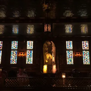 Main Dining area was uncomfortably too gothic dark. Cool stained glass windows.