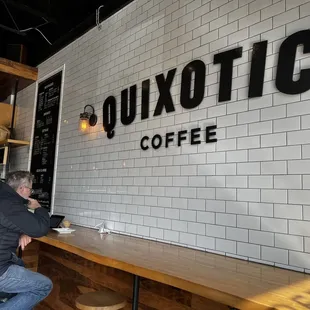 a man sitting at a bar