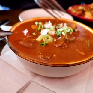 a bowl of soup on a plate