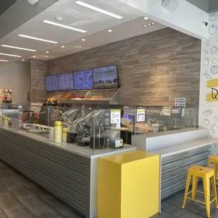 yellow stools and counter