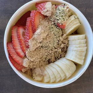 P Bowl- Peanut butter lovers will fall in love with this as it's also topped with granola, strawberries, maca, banana, and hemp seeds.