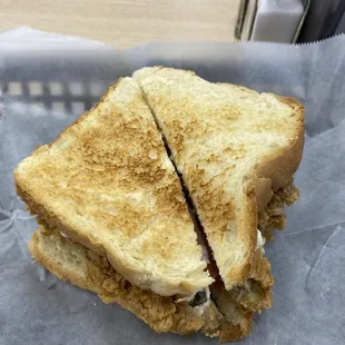 Fried oyster on white toast.