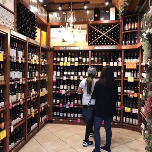 two women in a wine shop