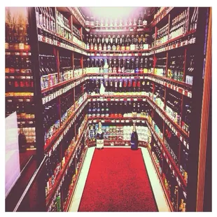 a red carpet in a liquor store