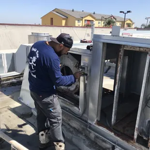 A commercial make up air unit being fully serviced by QwikTime