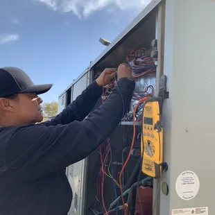 Ana work on air conditioner