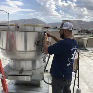 Jose at one of QwikTimes commercial customers doing a full inspection on a commercial kitchen hood