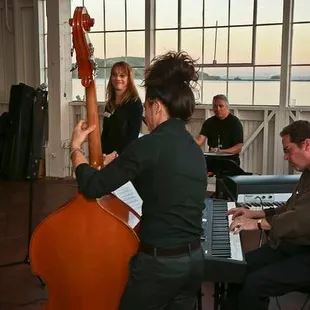 Kevin &amp; Barbara of R&amp;B Cellars performing with their group at the Riggers Loft winery.