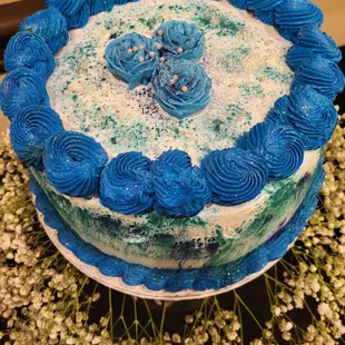 a blue frosted cake