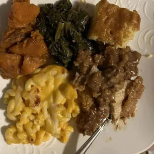 Mac and cheese Chicken fried steak and gravy Sweet potatoes  Greens Cornbread