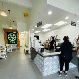 people standing at a counter
