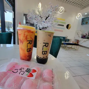 Mangonada with crystal boba, Vietnamese coffe with brown sugar boba, and strawberry mochi.