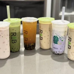 Strawberry Horchata Slush, Matcha Milk Tea, Passion Fruit Green Tea W/ Aloe Vera, Roasted Oolong Milk Tea, Taro Stormy
