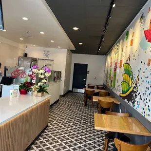 a woman taking a picture of a counter