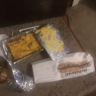 a hot dog, cheese, and macaroni