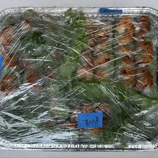 Should have taken the clear wrap off before taking the photo!! Grilled Beef &amp; Grilled Pork Spring Rolls with added Shrimps.