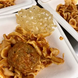 Housemade campanelle pasta with San Marzano tomato sauce and meatball