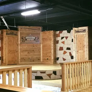 a stage set with wooden walls