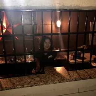 a woman in a jail cell