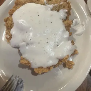 Chicken fried steak - good seasoning, crispy outside, huge portion. Gravy was good too.