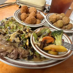 Hamburger steak with corn nuggets, okra, and grilled veggies