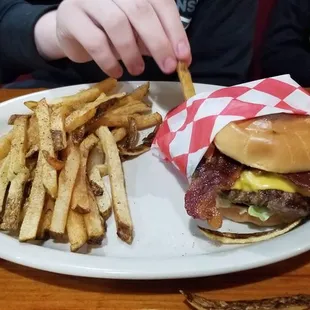 Juicy bacon cheeseburger and fries. $9.49