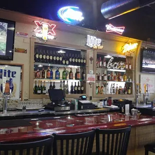 Fully stocked bar that offers happy hour from 2-7pm.